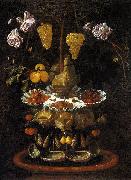 Juan de  Espinosa A fountain of grape vines, roses and apples in a conch shell oil on canvas